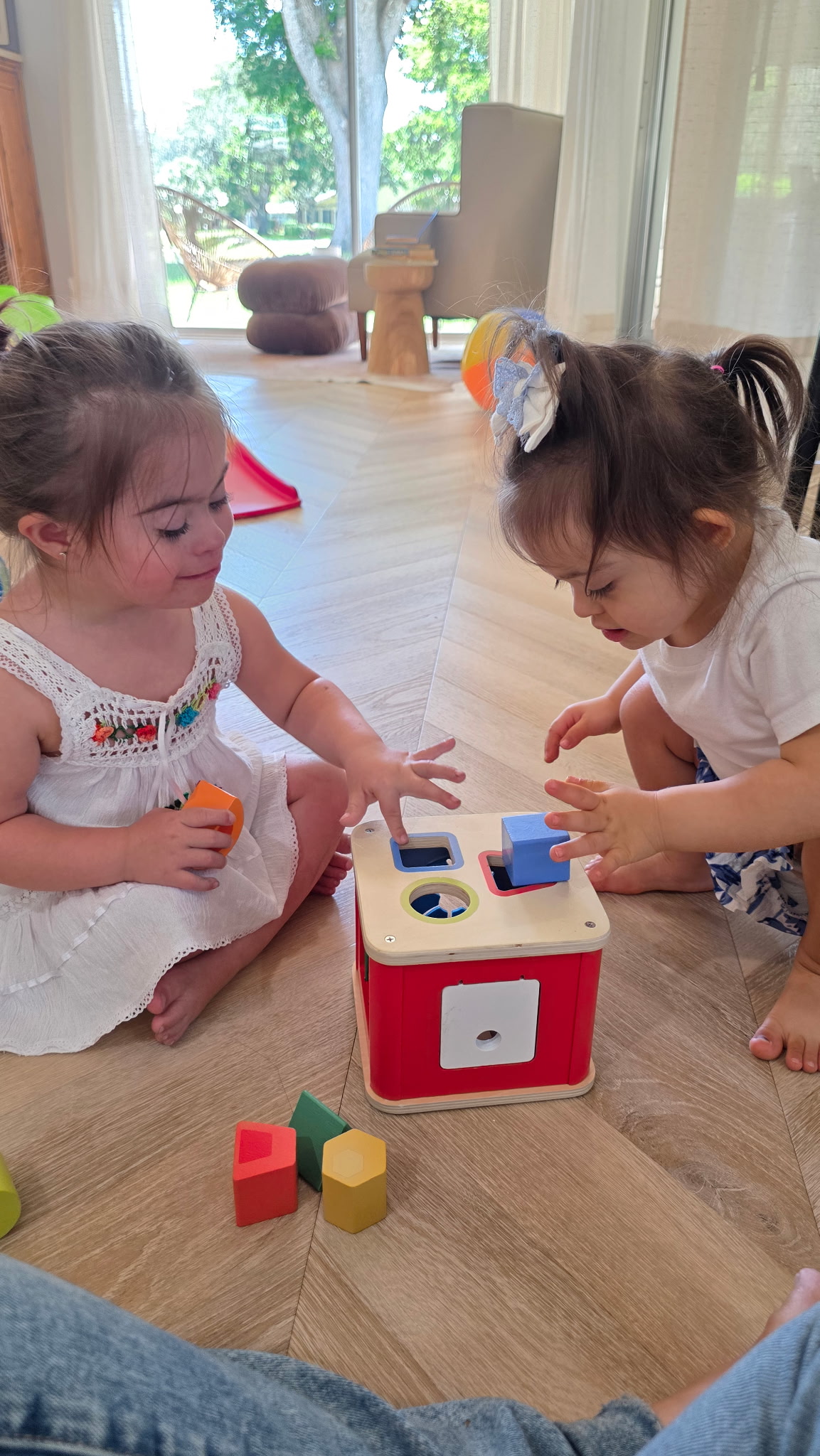 Two friends smiling together at a Pom-Pom's Players program